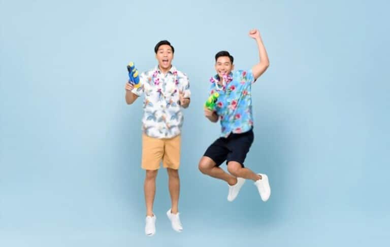two men wear hawaiian shirt and khaki shorts Bermuda two men wear hawaiian shirt and khaki shorts Bermuda
