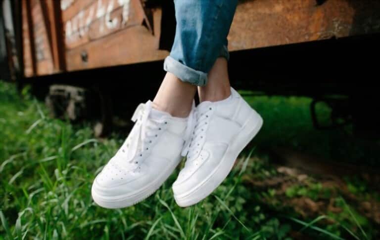 white shoes and dark jeans