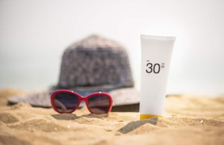 bottle sunscreen location on sandy beach
