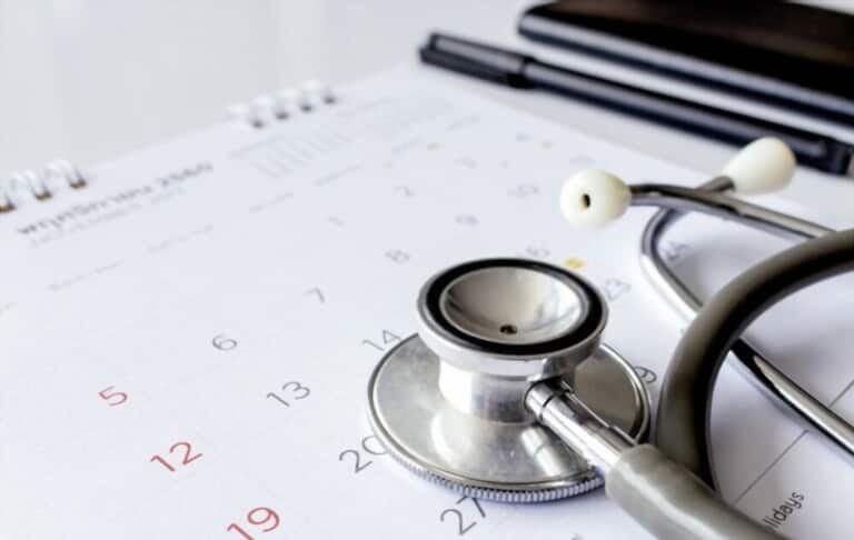 /annual checkup concept stethoscope on calendar