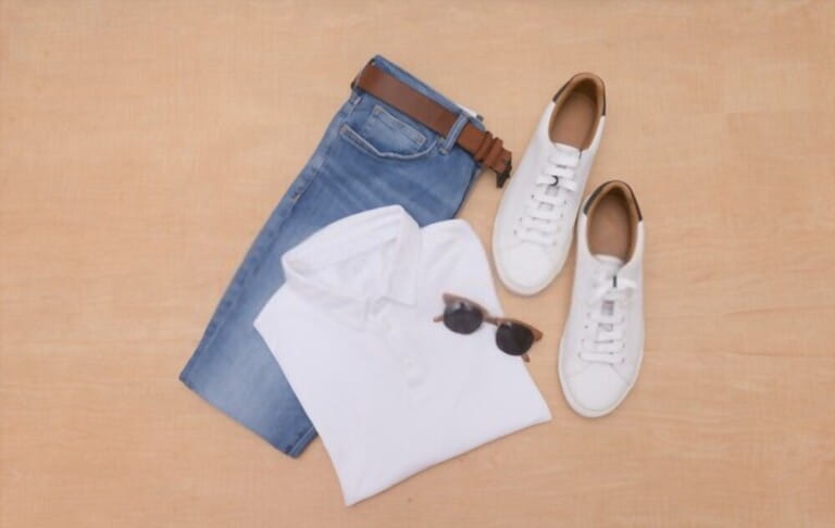 Men's fashion white shirt and accessories on wooden board background, flat lay