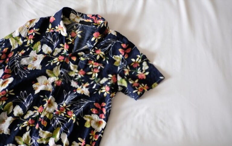 Hawaiian shirt is placed on a white mattress Hawaiian shirt is placed on a white mattress