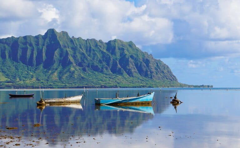 Boats moored on the lake in Kaneohe Bay with beautiful scenery