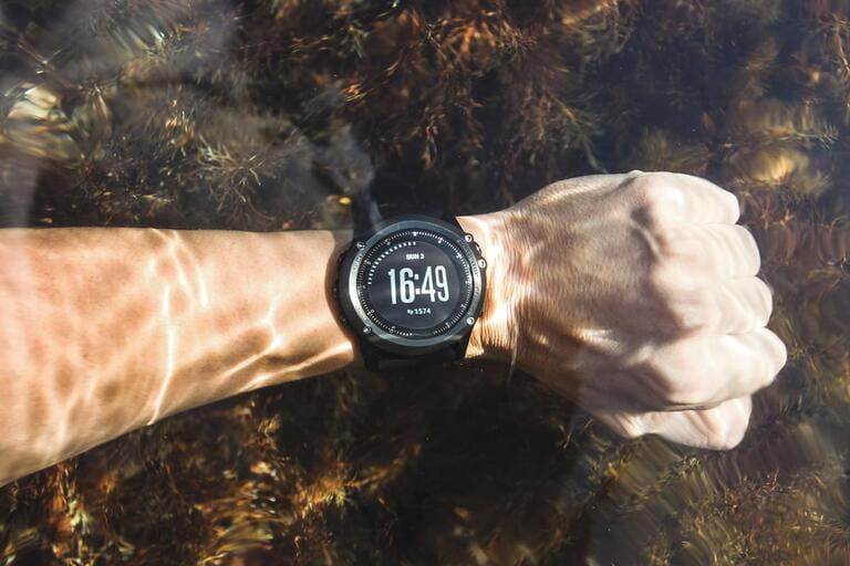 Waterproof sport watches underwater on hand Waterproof sport watches underwater on hand