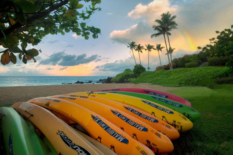 Kayaks on beach with rainbow. Maui, Hawaii Kayaks on beach with rainbow. Maui, Hawaii