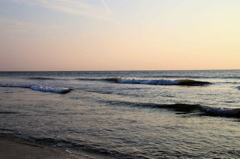 Walk on Virginia Beach at sunrise