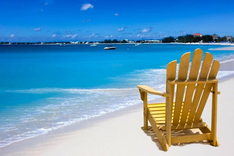 Yellow chair on white sand Caribbean beach Yellow chair on white sand Caribbean beach